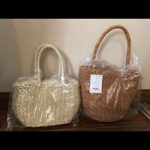 Braided brown and white bags with tags